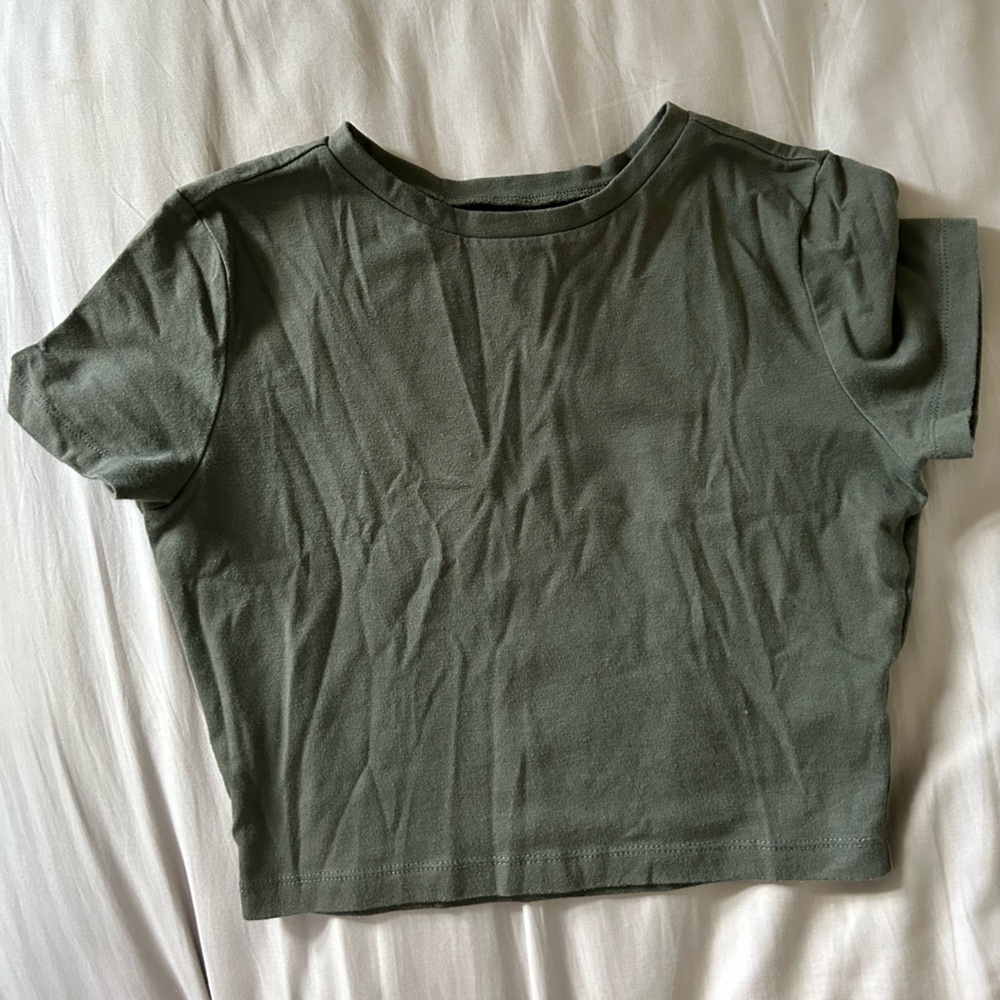 Small dark green baby tee